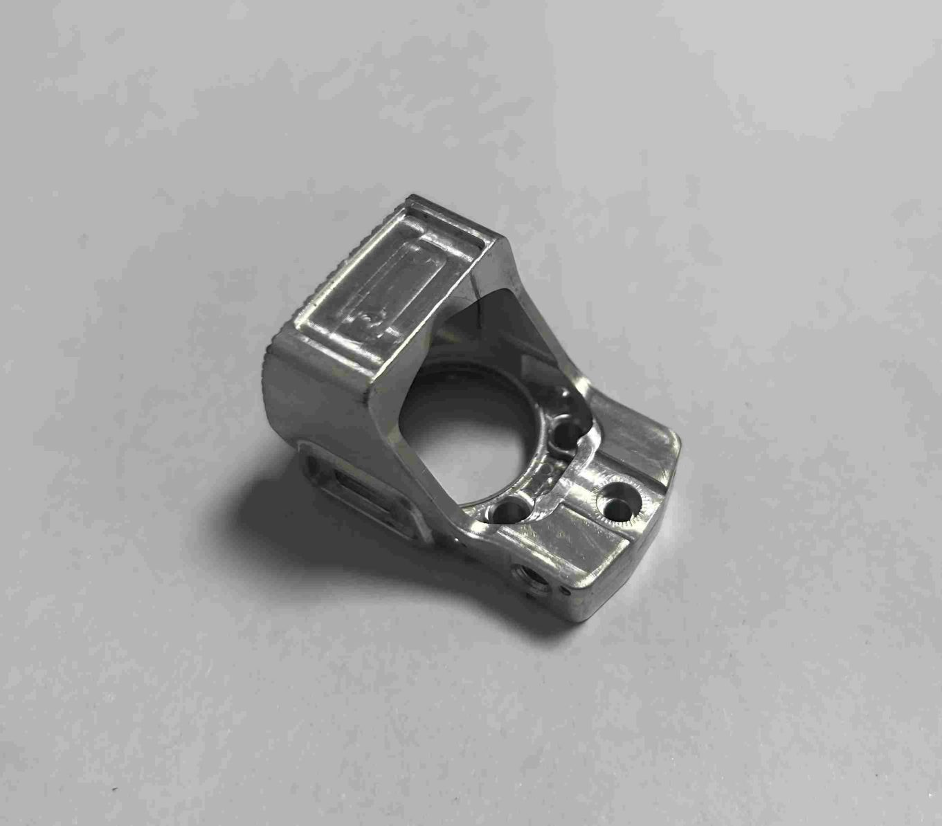 High-stability aluminum mount for optical equipment, featuring precise adjustment features and low thermal expansion.