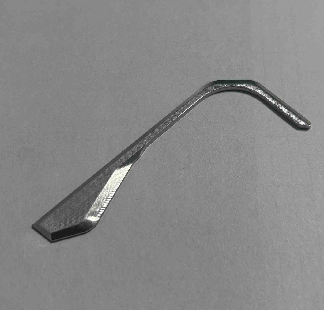 Long aluminum guide rail or linear motion component, milled for straightness and wear resistance.
