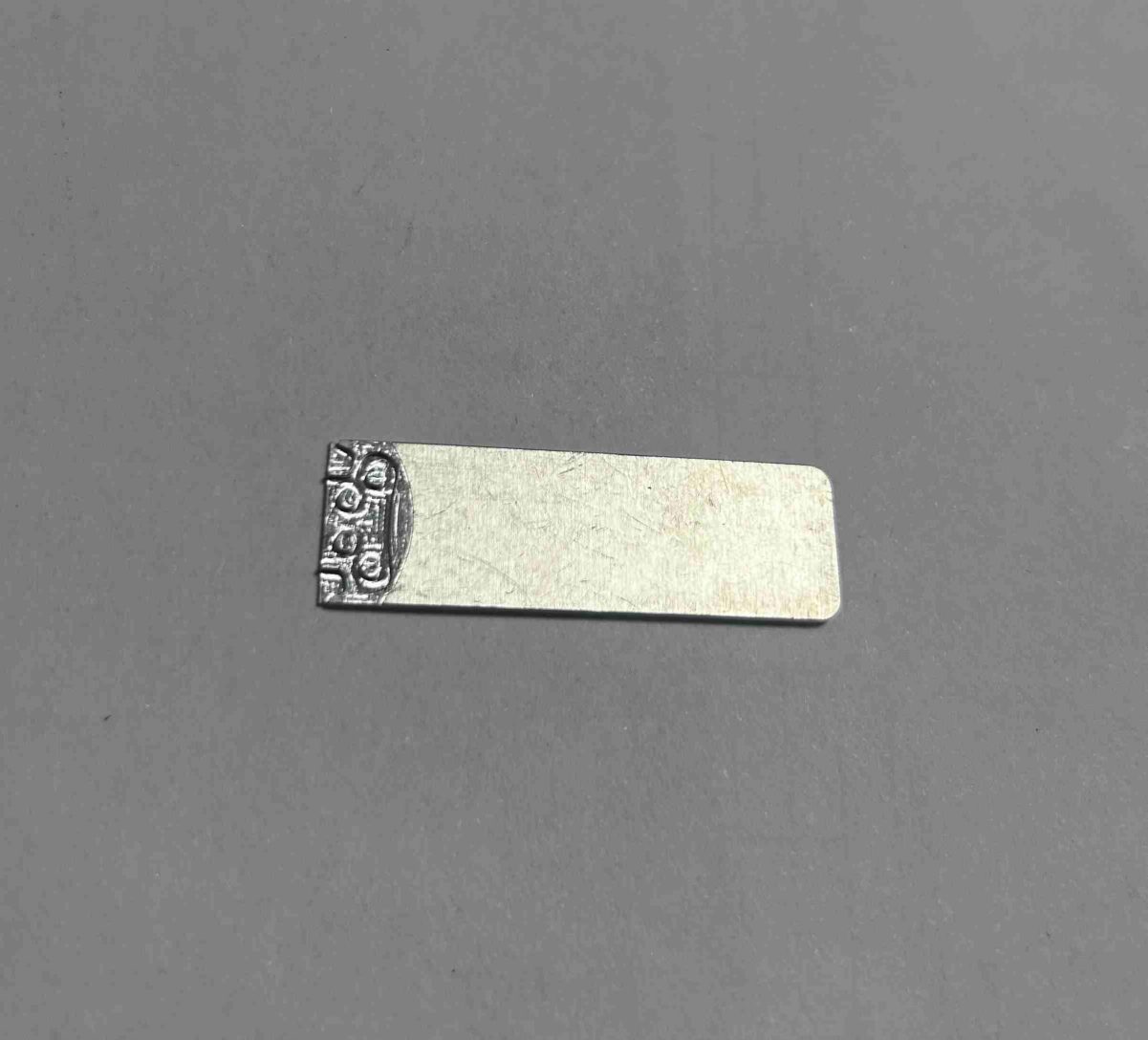 High-precision aluminum test socket or adapter for electronic device testing and programming.
