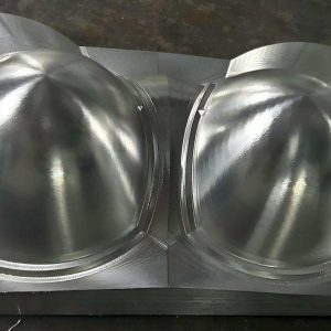 Complex aluminum water block for liquid cooling systems, featuring intricate internal passages.