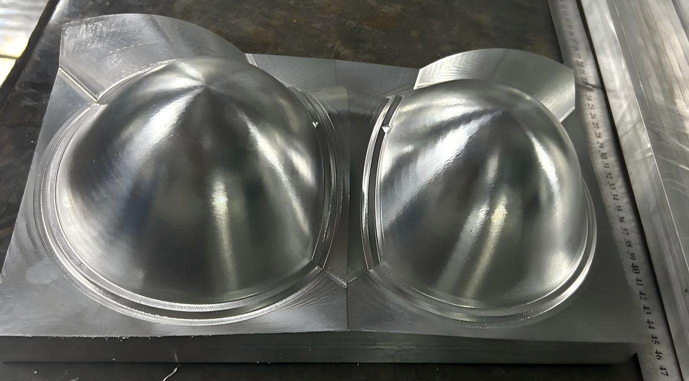 Complex aluminum water block for liquid cooling systems, featuring intricate internal passages.