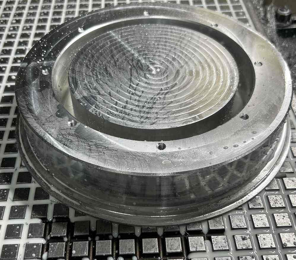 Aluminum component for consumer goods, combining aesthetic appeal with functional durability.