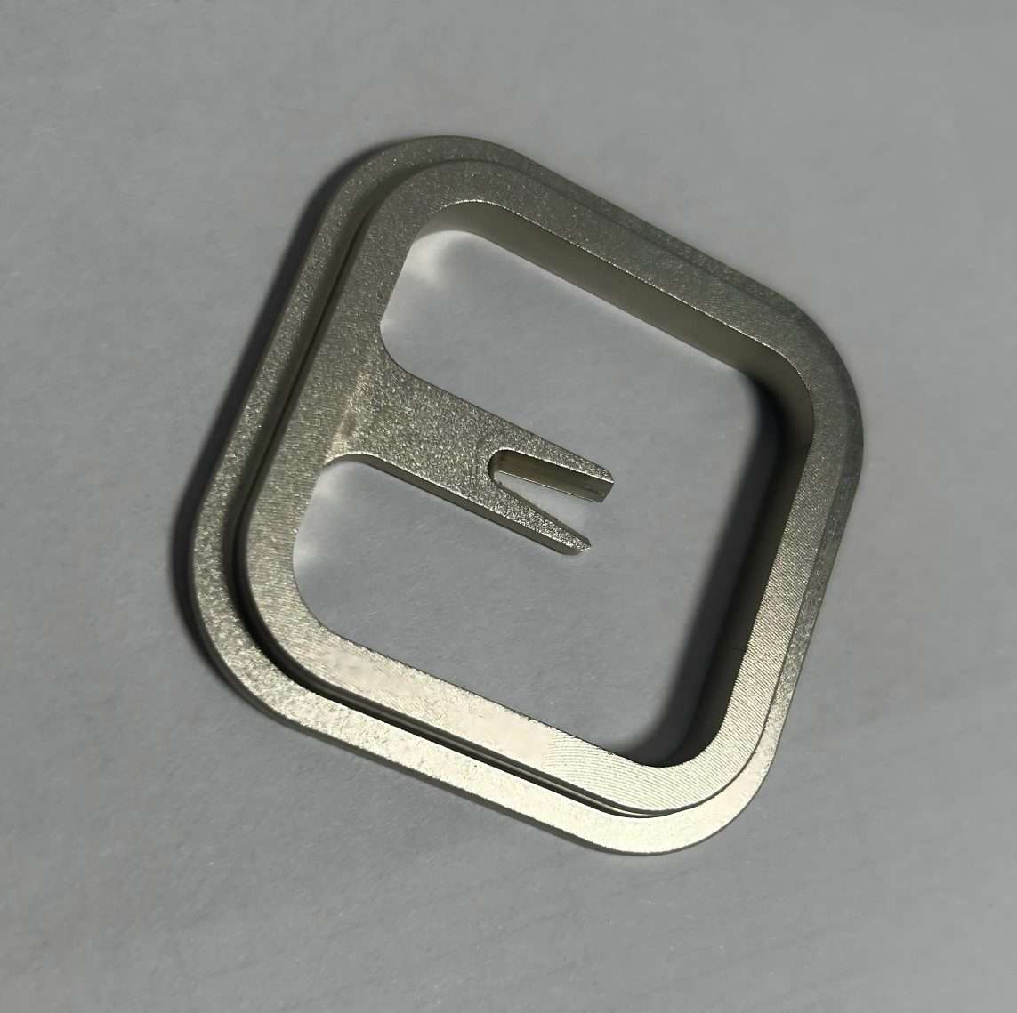 Aluminum button or interface component, providing a tactile and high-quality user experience.