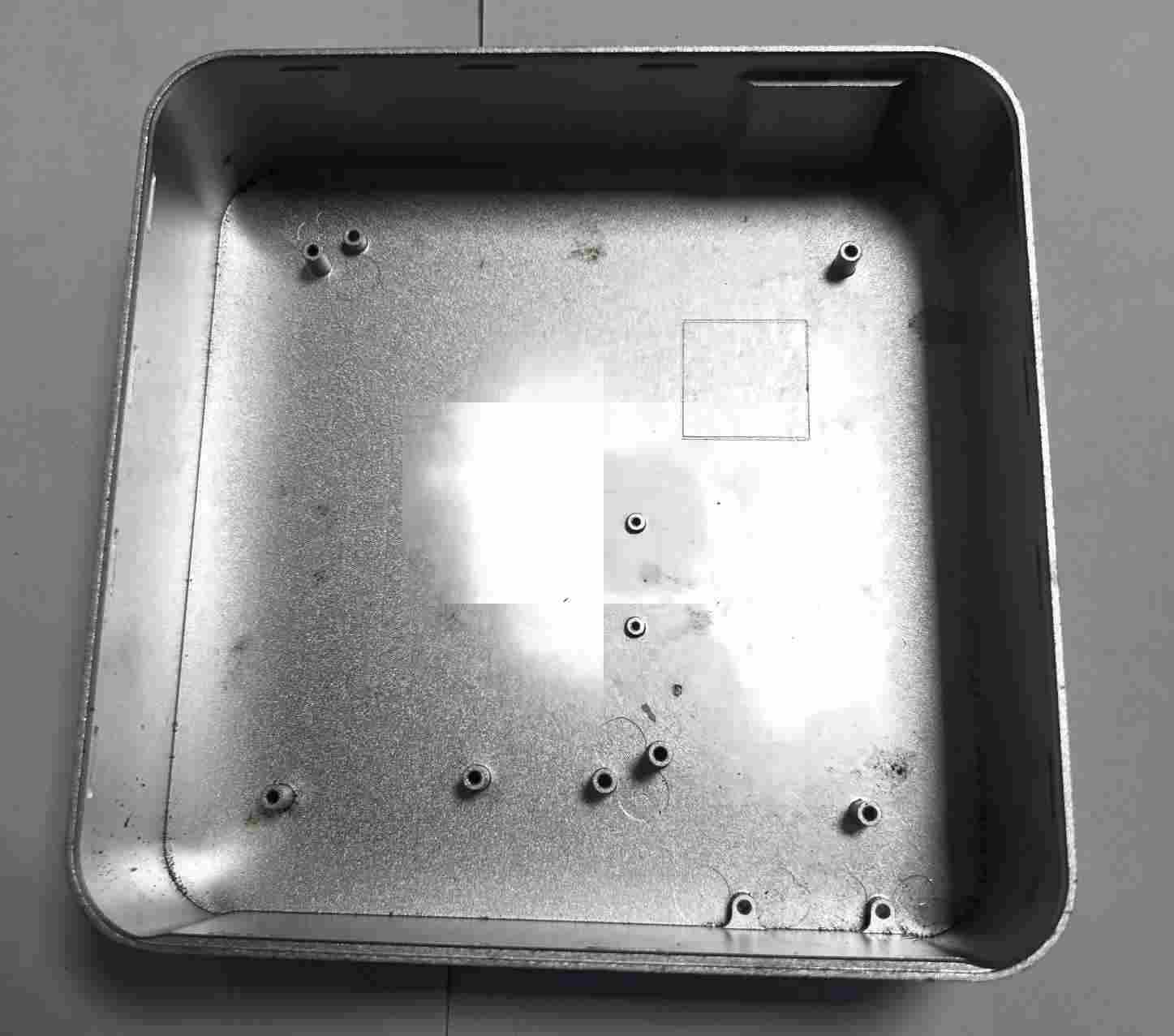 CNC machined aluminum housing for electronics, featuring precise cutouts and a durable anodized finish.