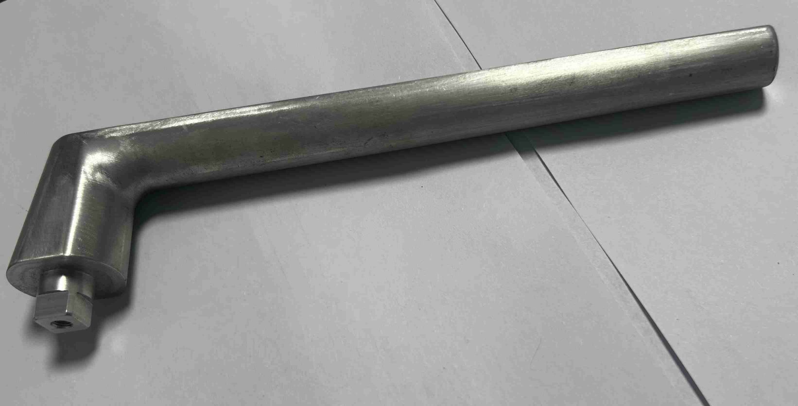 Aluminum component with complex 3D geometry, showcasing 4.5-axis machining capabilities for prototypes.