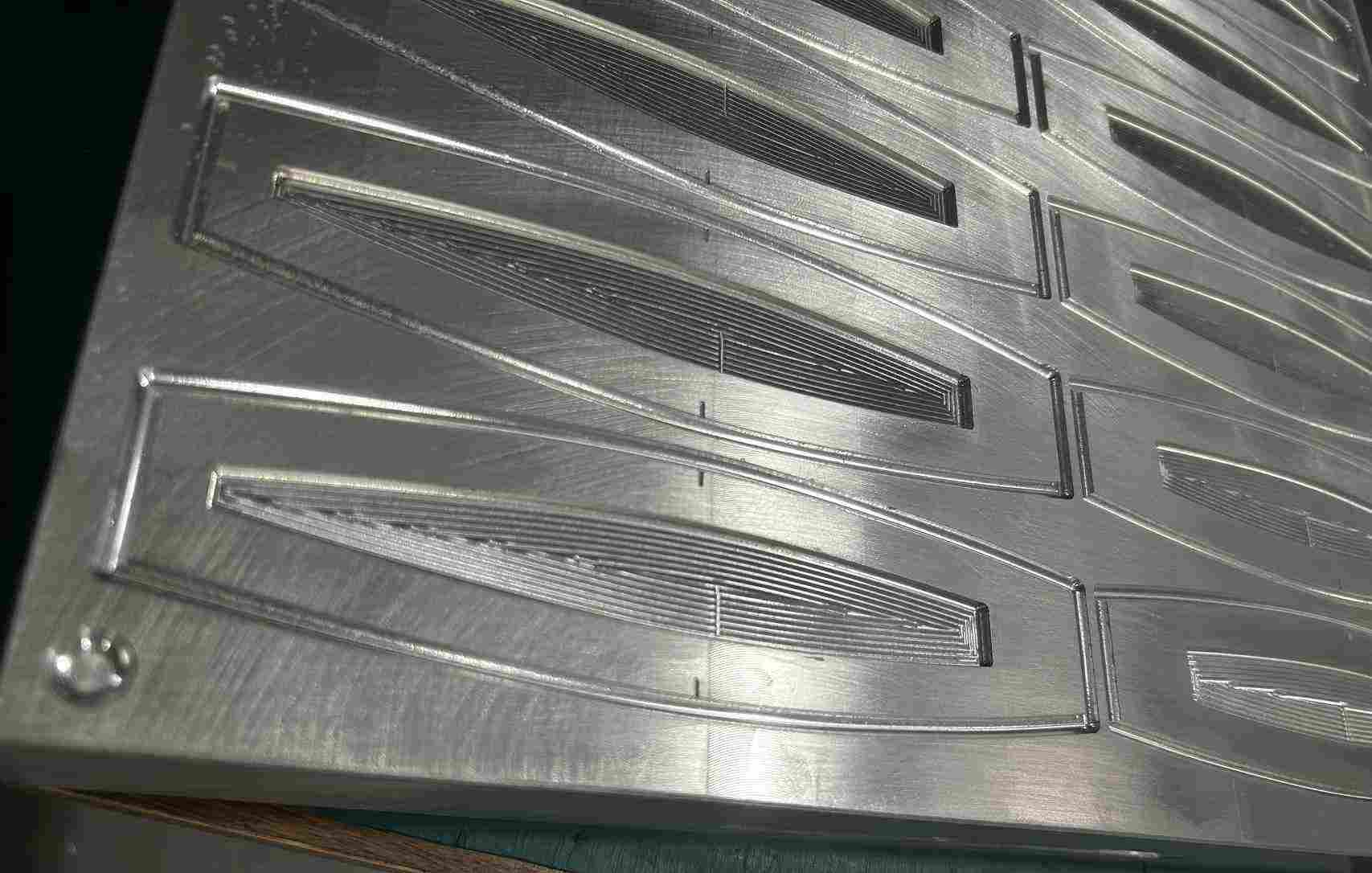 Thin-walled aluminum cover or panel, milled to provide a lightweight and aesthetically pleasing exterior.