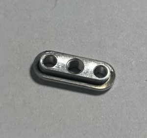 Precision CNC machined aluminum knob or handle, featuring a knurled or smooth finish for ergonomic use.