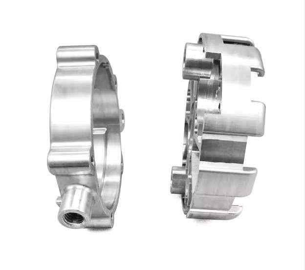 Precision CNC machined aluminum housing for electronic equipment, showing complex geometry and fine finish.