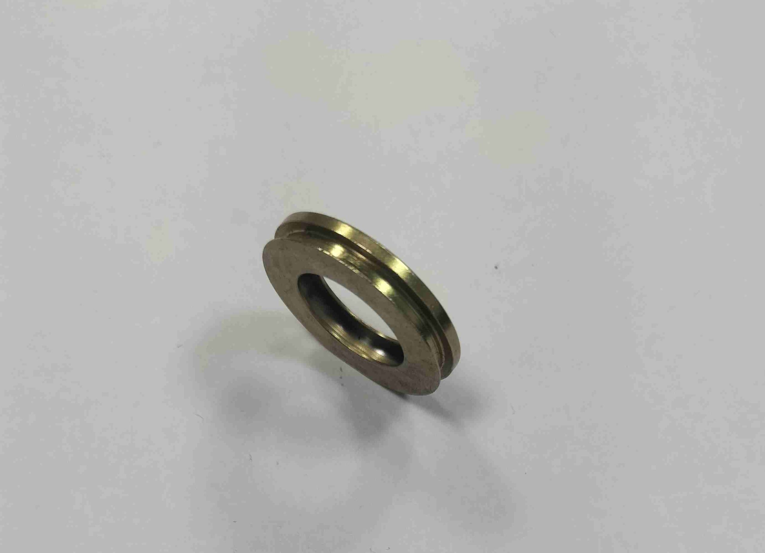 Copper bushing or contact point, providing low electrical resistance and good wear characteristics.