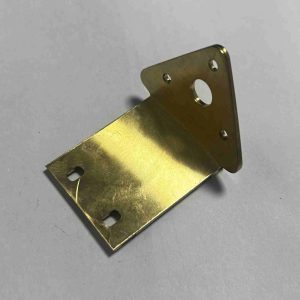 Custom copper fixture or mount with 3D geometry, showcasing multi-axis machining capability for specialized applications.