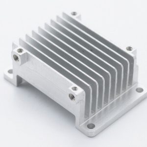 Aluminum heatsink enclosure for an electronic control unit (ECU), integrating cooling fins and mounting features in one part.