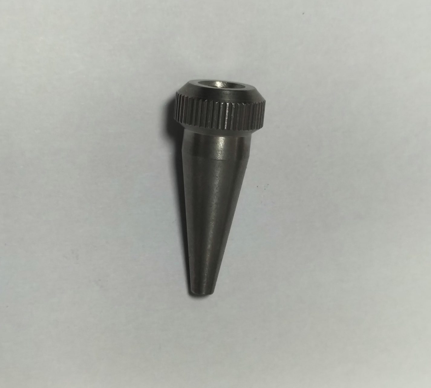 Stainless steel threaded fitting or connector, CNC turned for leak-proof performance in fluid systems.