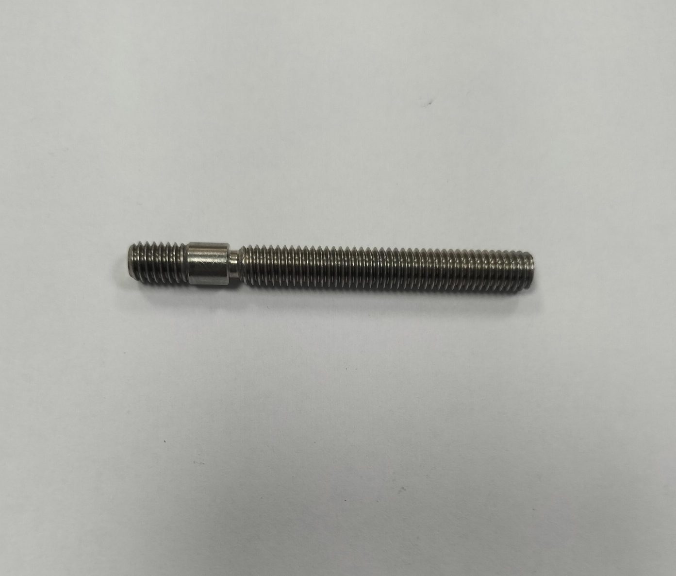 Precision stainless steel shaft or dowel pin, perfect for axles, pivots, and alignment in assemblies.