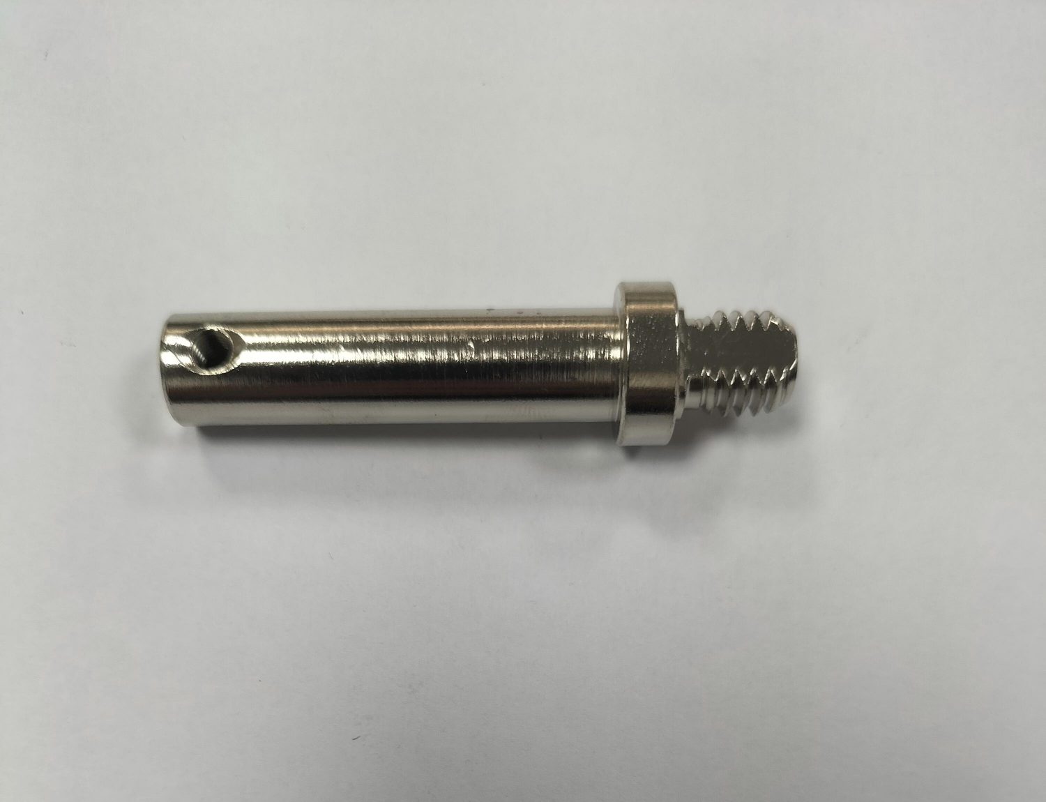 Custom stainless steel machined component, demonstrating ability to produce complex, application-specific parts.