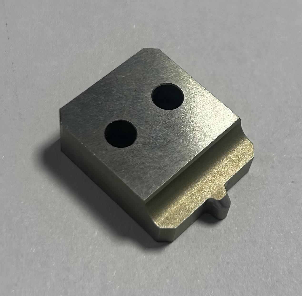 CNC machined stainless steel knob or handle with knurled grip, offering durability and a professional aesthetic.