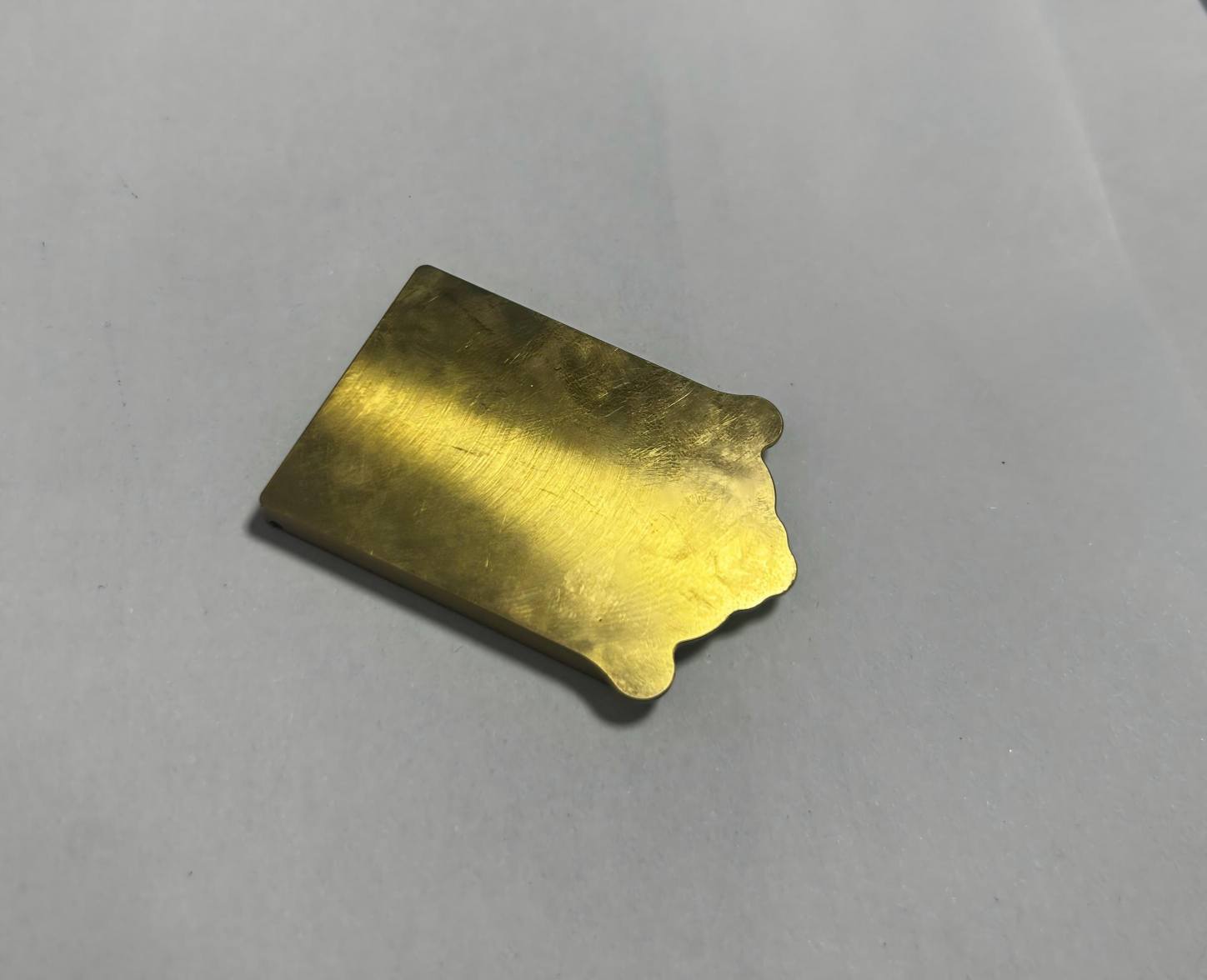 Precision CNC machined brass car shim, custom brass auto positioning plate, decorative copper automotive component with curved edge