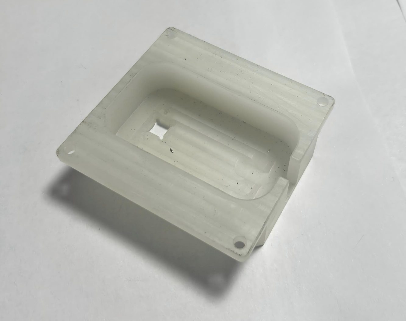 Custom CNC machined square acrylic fixture, transparent plastic component for electronic device assembly, precision acrylic part with mounting holes