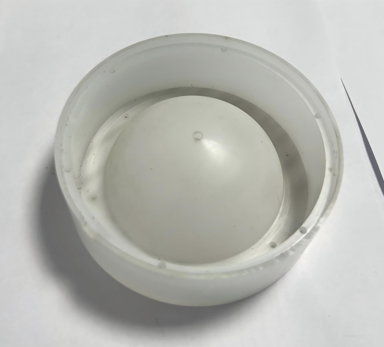 CNC machined white plastic hemisphere fixture, custom plastic component for electronic assembly, precision plastic part for equipment