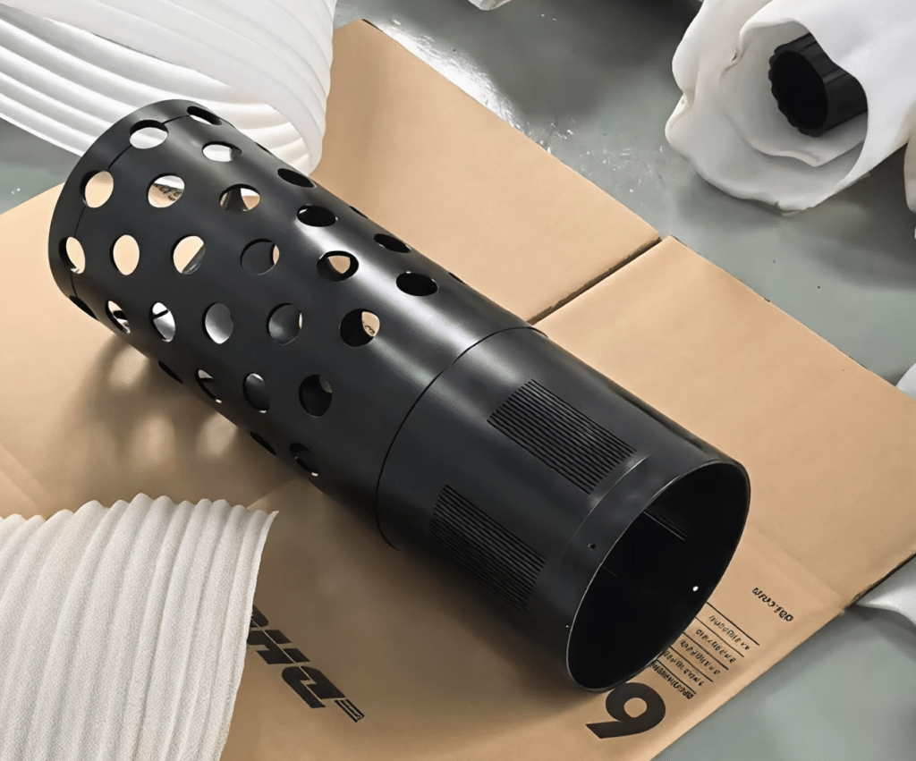 CNC machined perforated steel cylinder part with black oxide blackening surface treatment, custom tubular steel component for export machining project